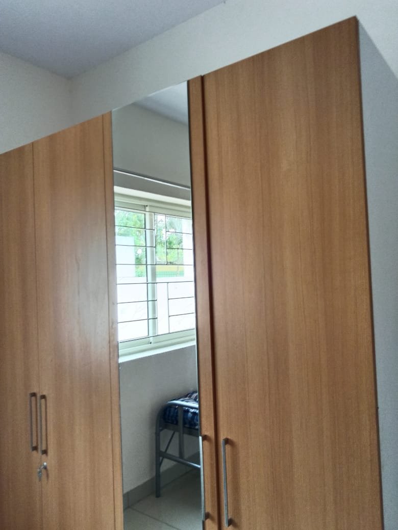 Glossy Wooden Wardrobe & Mirror Cleaning